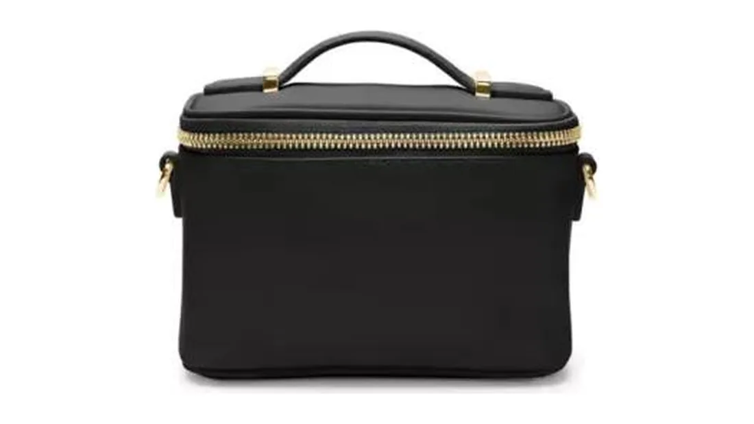 Boxy cosmetic bag with a structured shape, top handle and zip closure