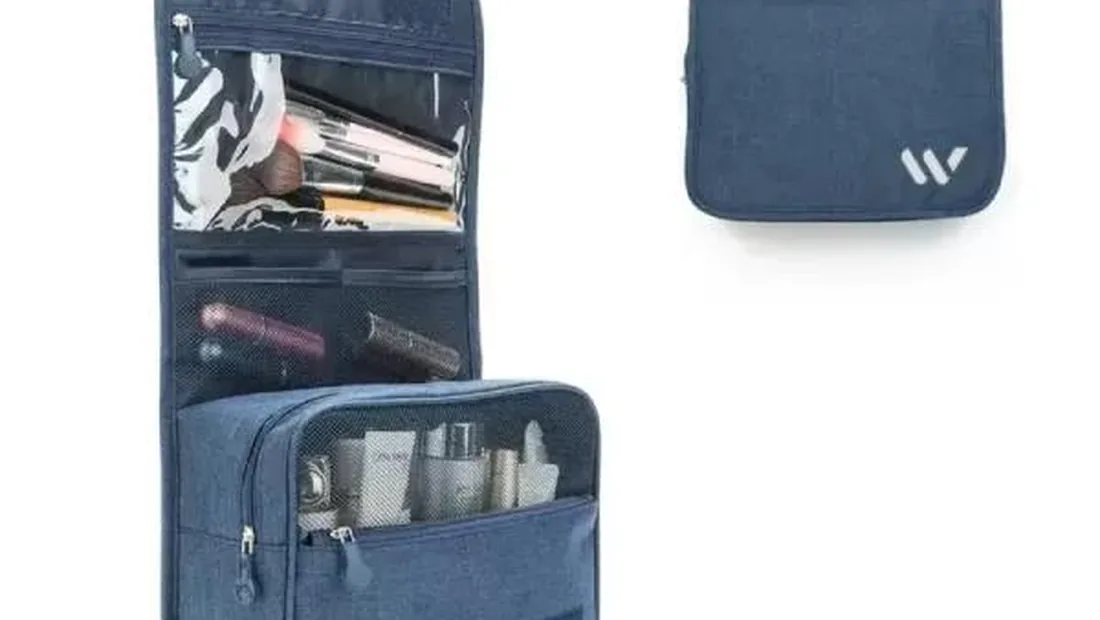 Men's leather cosmetic bag in a classic dopp kit shape